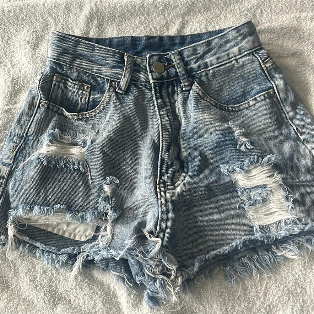 Blue ripped jeans shorts